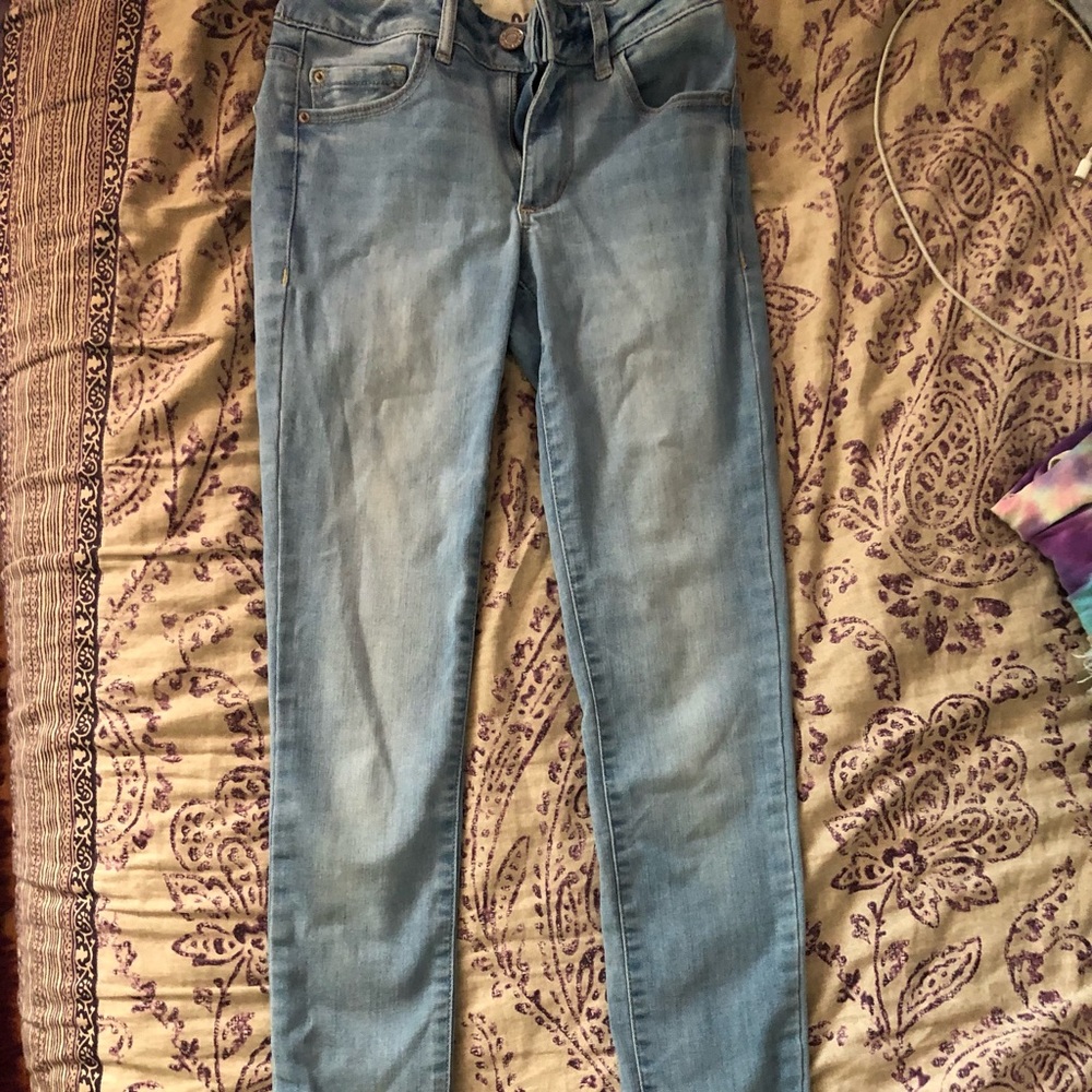 Light blue skinny jeans.